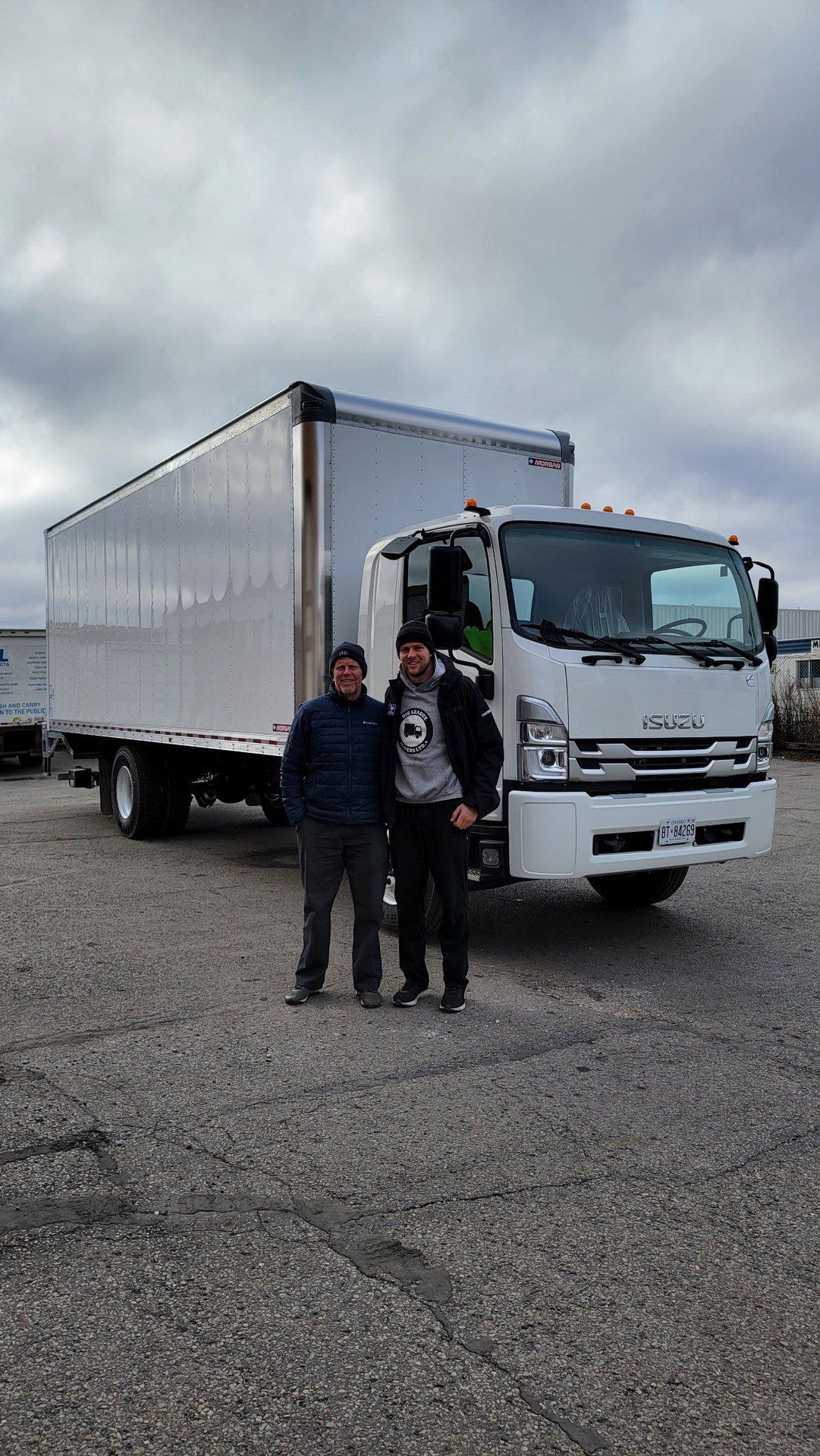 two movers moving furniture