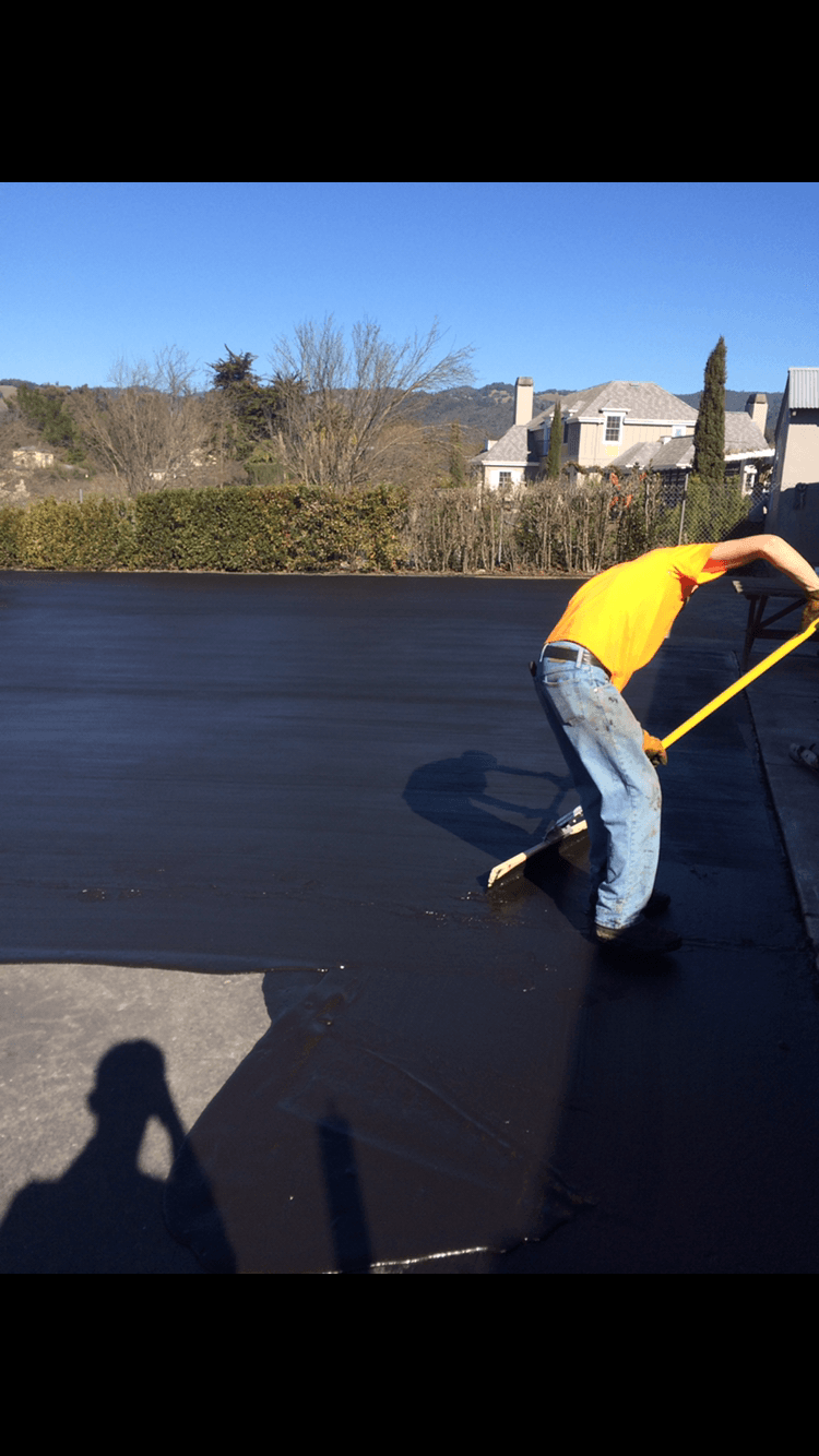 Man Putting Asphalt — Vacaville, CA — American Asphalt
