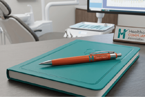 Turquoise notebook with orange pen on a desk in a medical office waiting room