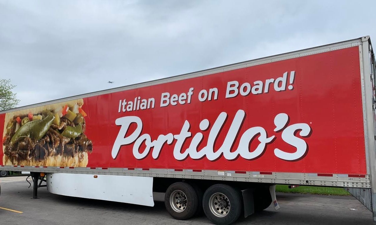 truck trailer with graphics that read Italain Beef on Board, Portillo's