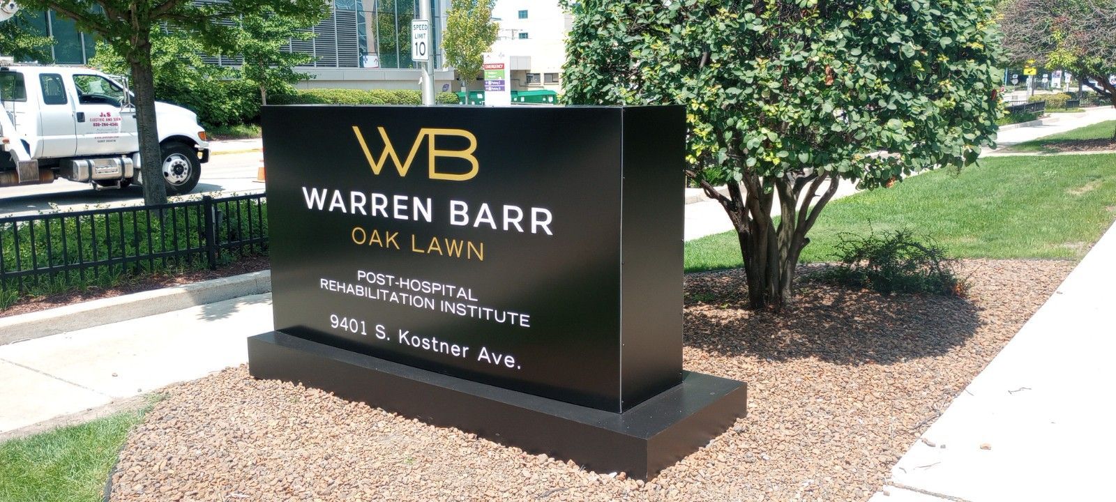 Black, rectangular sign for 