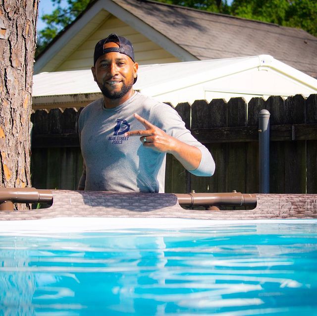 Man Showing Peace Sign — New Orleans, LA — Blue Street Pools Man Showing Peace Sign — New Orleans, LA — Blue Street Pools