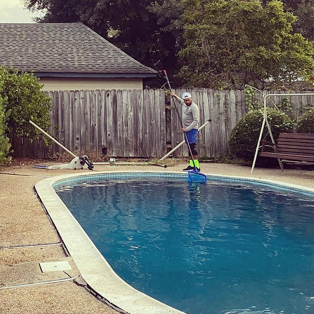 Man Doing Pool Cleaning — New Orleans, LA — Blue Street Pools