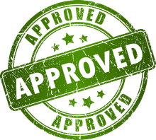 A green stamp that says approved on it