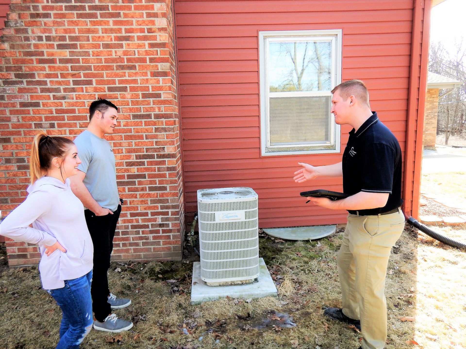The House Inspector is talking to a Couple - Milton, WI - Home Pro Inspection Services Inc.