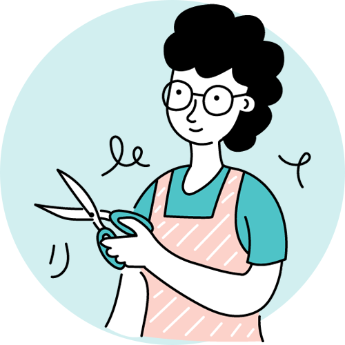 A woman is holding a pair of scissors in her hands.