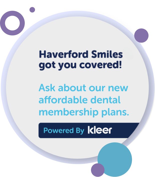 Dr. Souliman of Haverford Smiles in Haverford PA is sitting and smiling