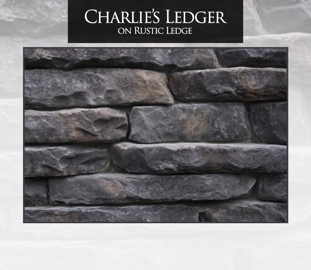 Close-up of dark gray and brown rustic stone wall with the text 
