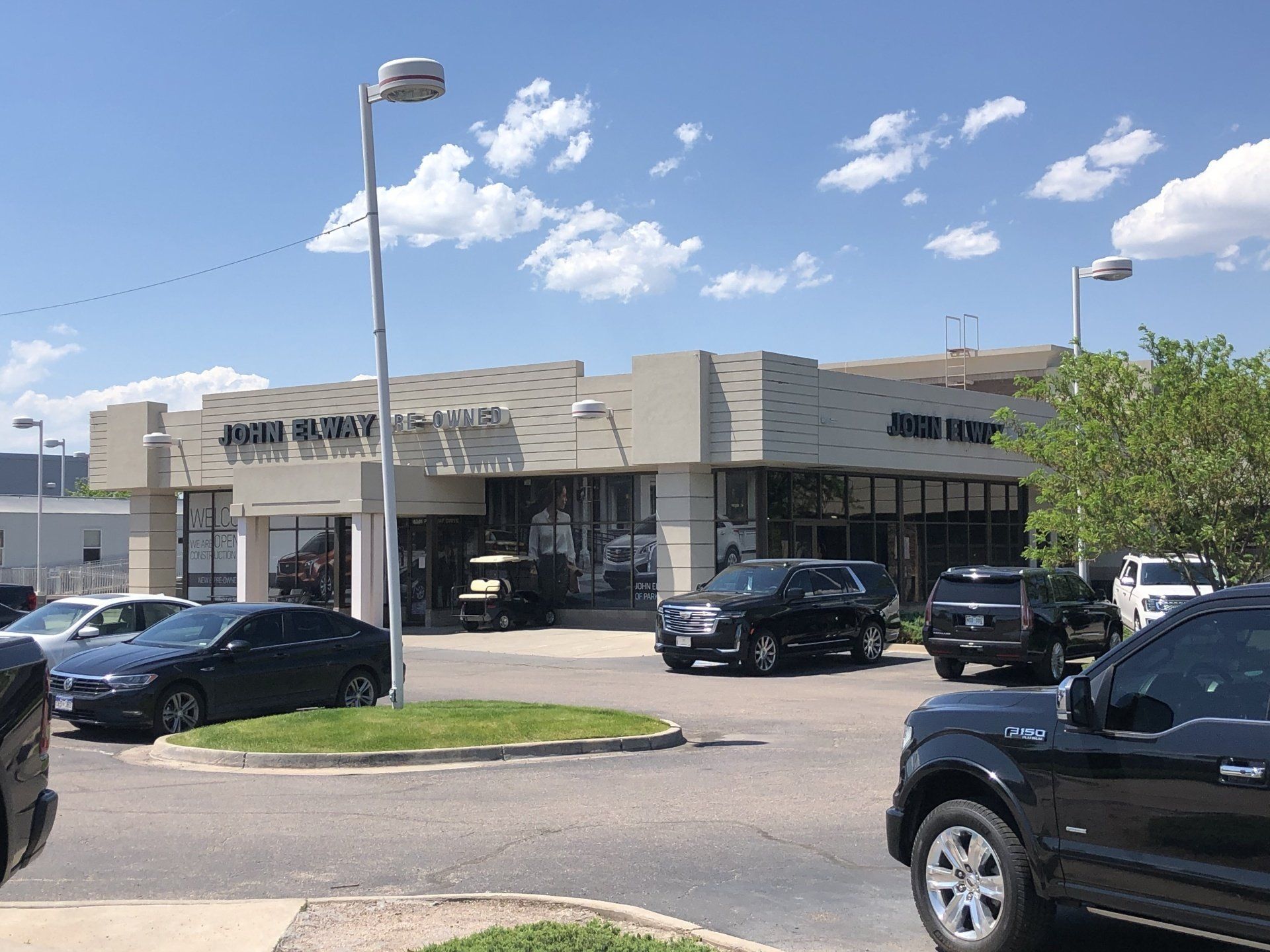 cars parked in front of building