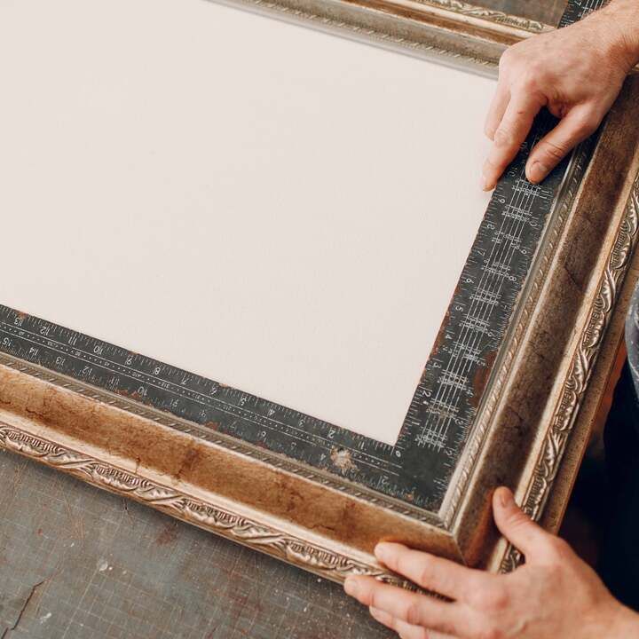A print being examined for framing