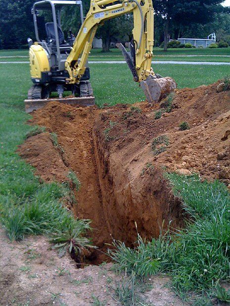 Digging a Hole — Chester County, PA — J. Gallagher Septic & Wastewater Control