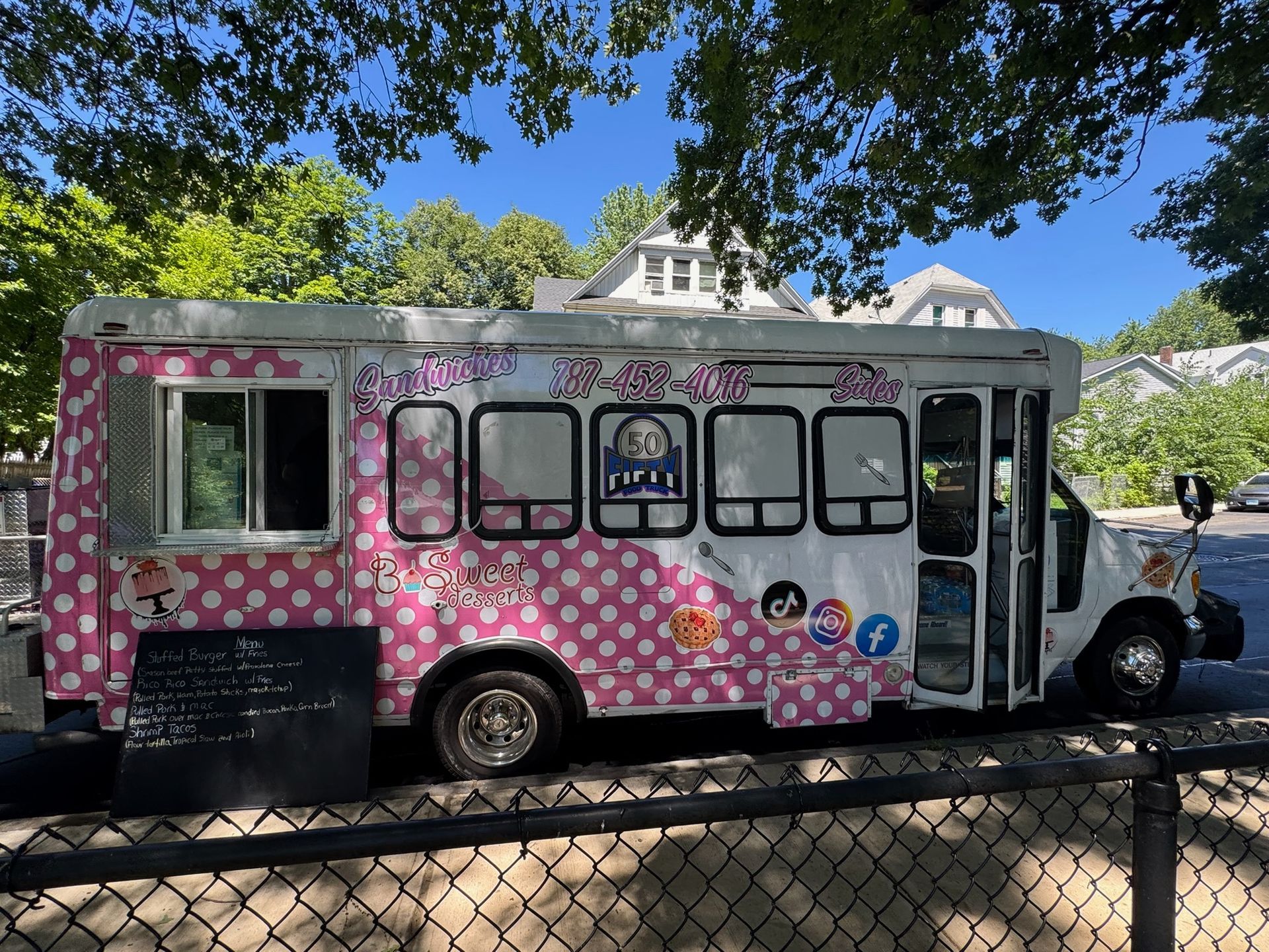 The pink polka-dot 'Be Sweet Desserts' food truck. The truck includes their phone number: 787-452-4016 and shows the logos for Instagram, Tiktok, and Facebook.