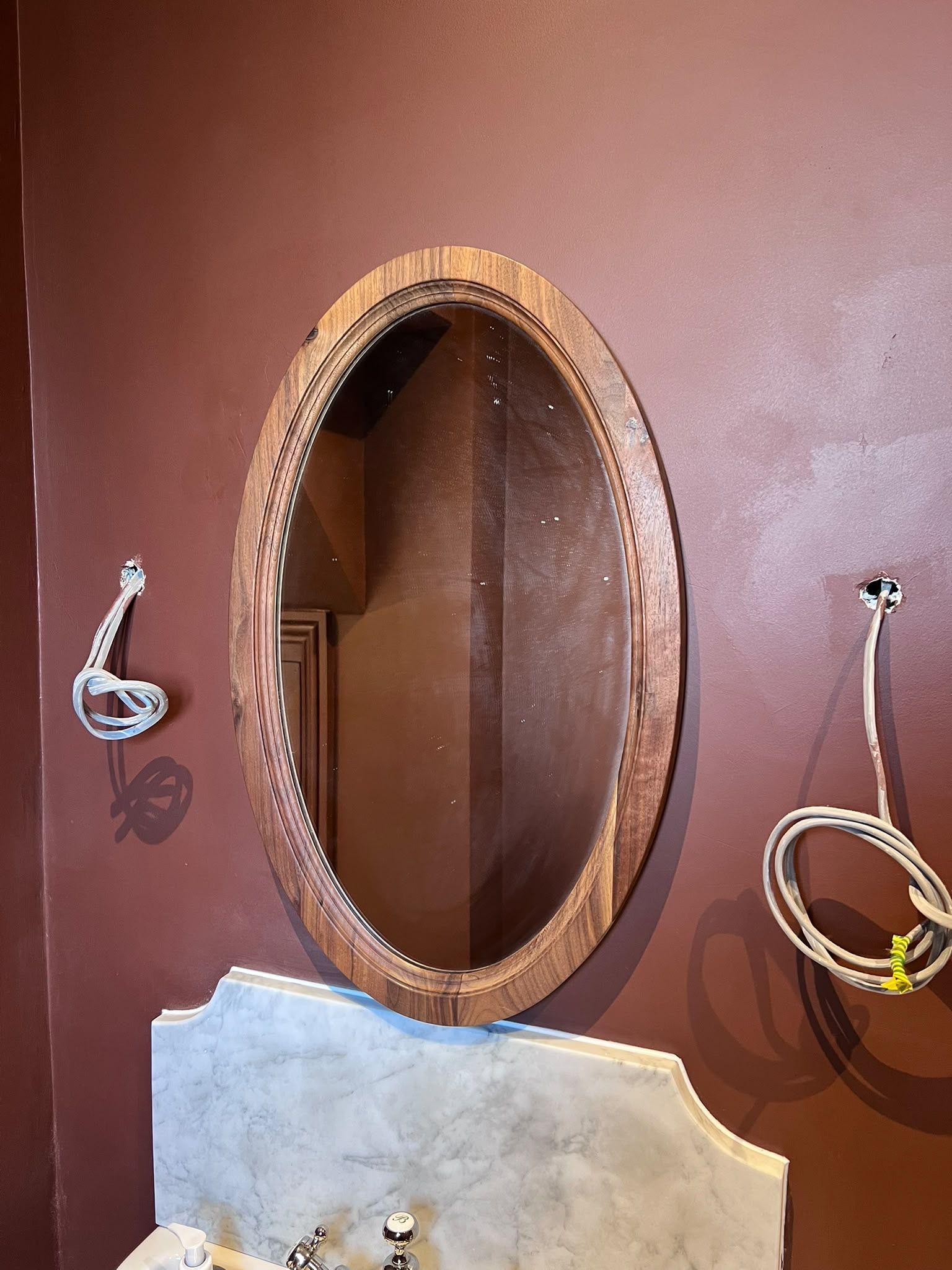 Bathroom mirror hung