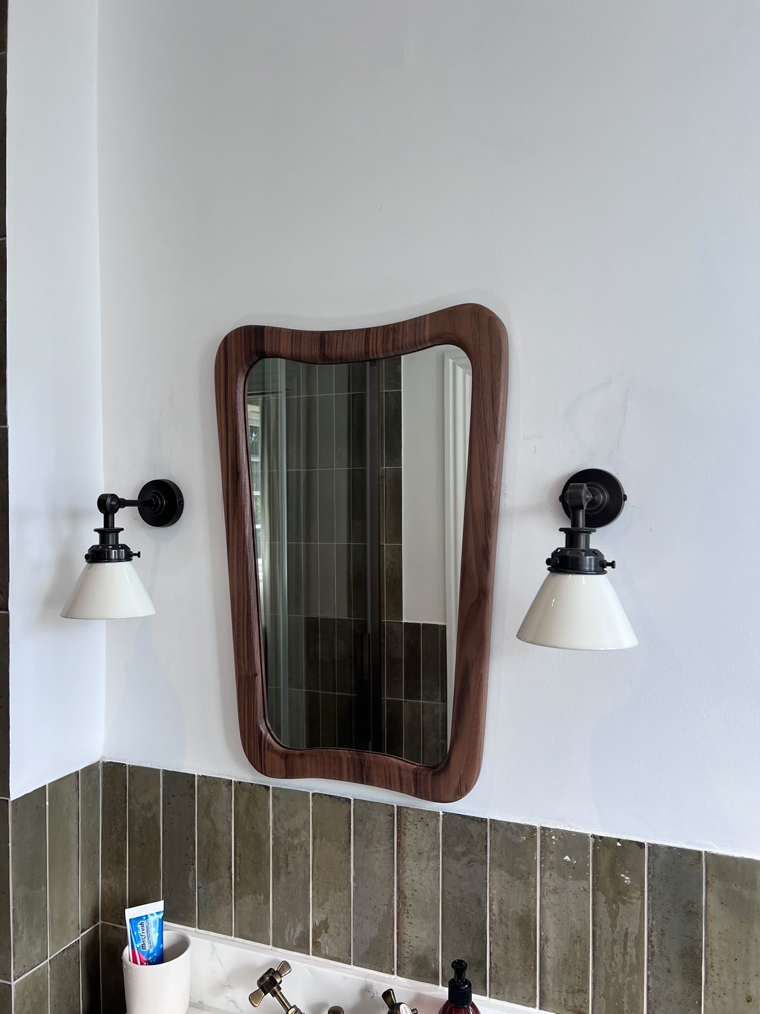 Bathroom mirror hung