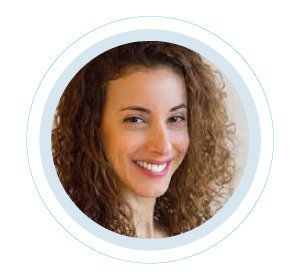 A woman with curly hair is smiling in a circle.