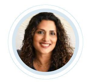 A woman with curly hair is smiling in a circle.