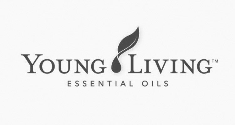The young living essential oils logo is black and white.