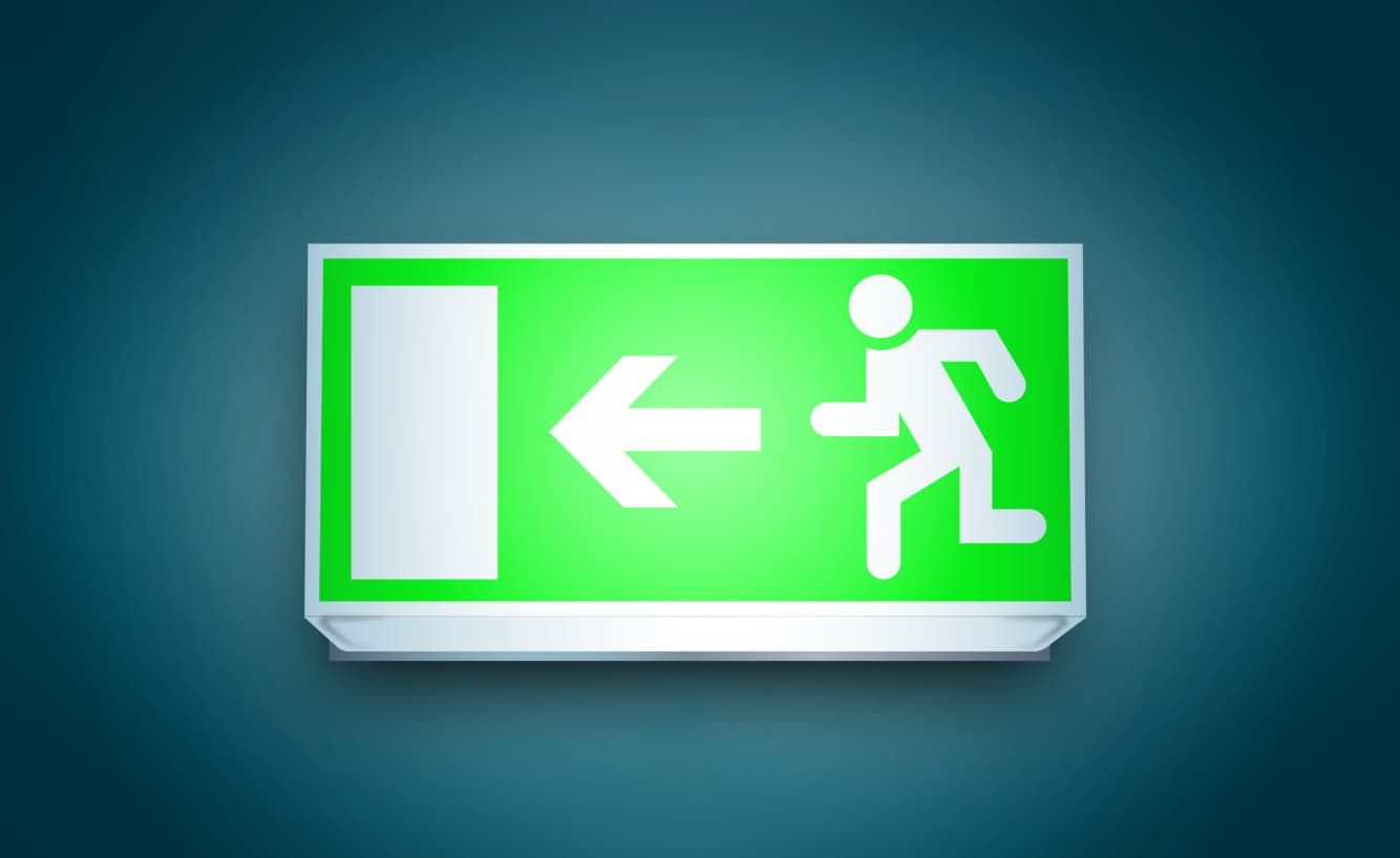 Green Illuminated Emergency Exit Sign With Person Running — Stellar Test and Tag in Gunnedah, NSW