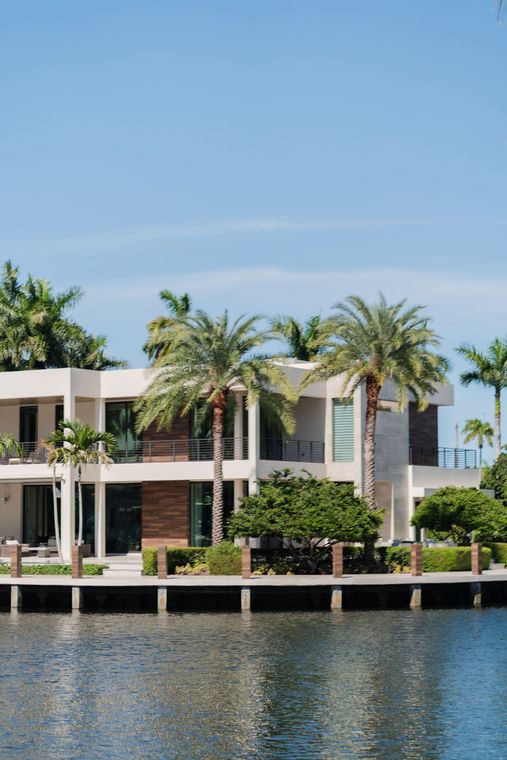 Florida waterfront homes with palm trees