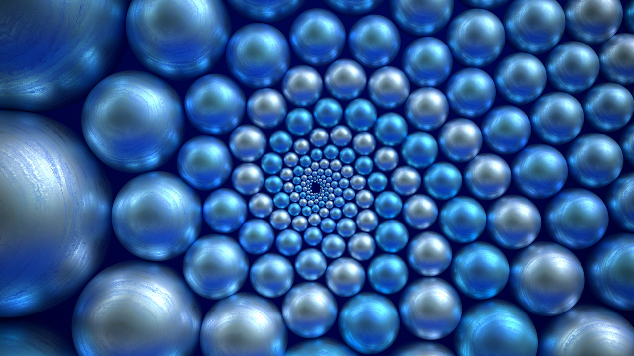 Spiral of blue and silver spheres, diminishing in size toward the center.