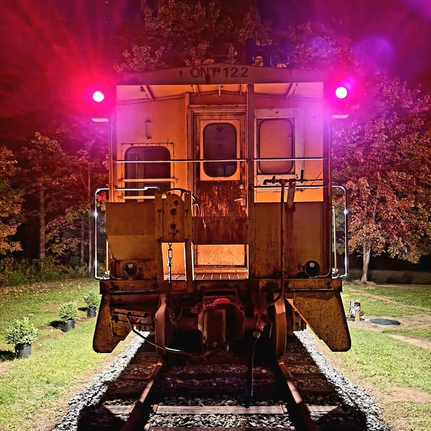 A train with the number 122 on the front of it