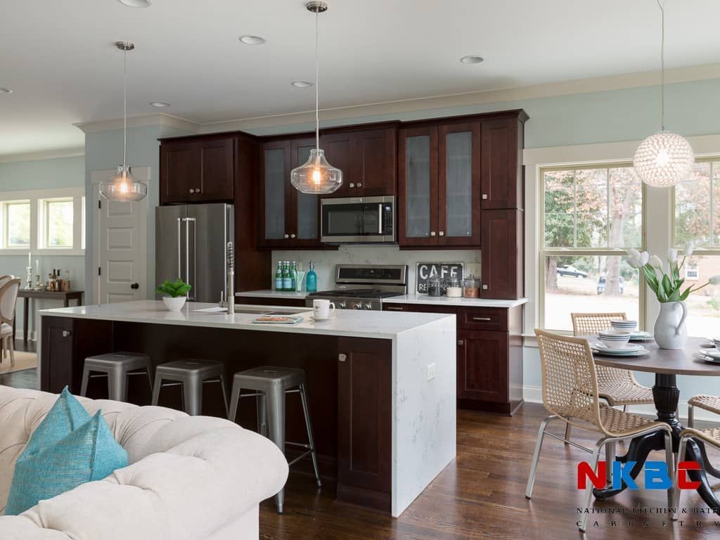 A kitchen with a large island in the middle of it
