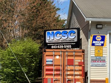 A shipping container has a sign that says ncsc on it | North County Service Center