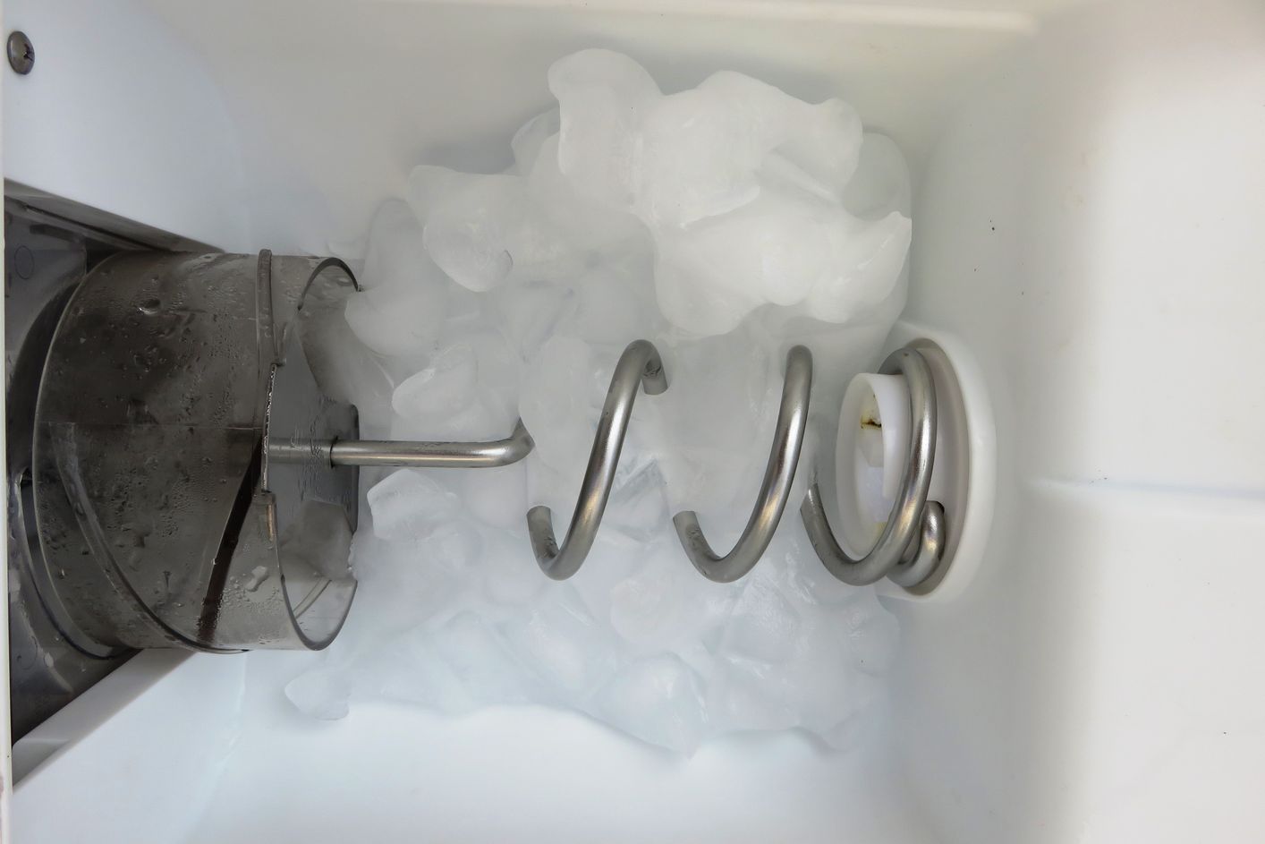 A close up of a machine that is making ice.
