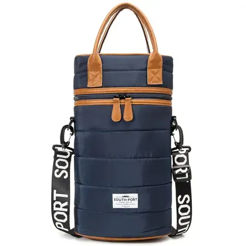 Bolso de hombro cilíndrico azul marino con asas color canela