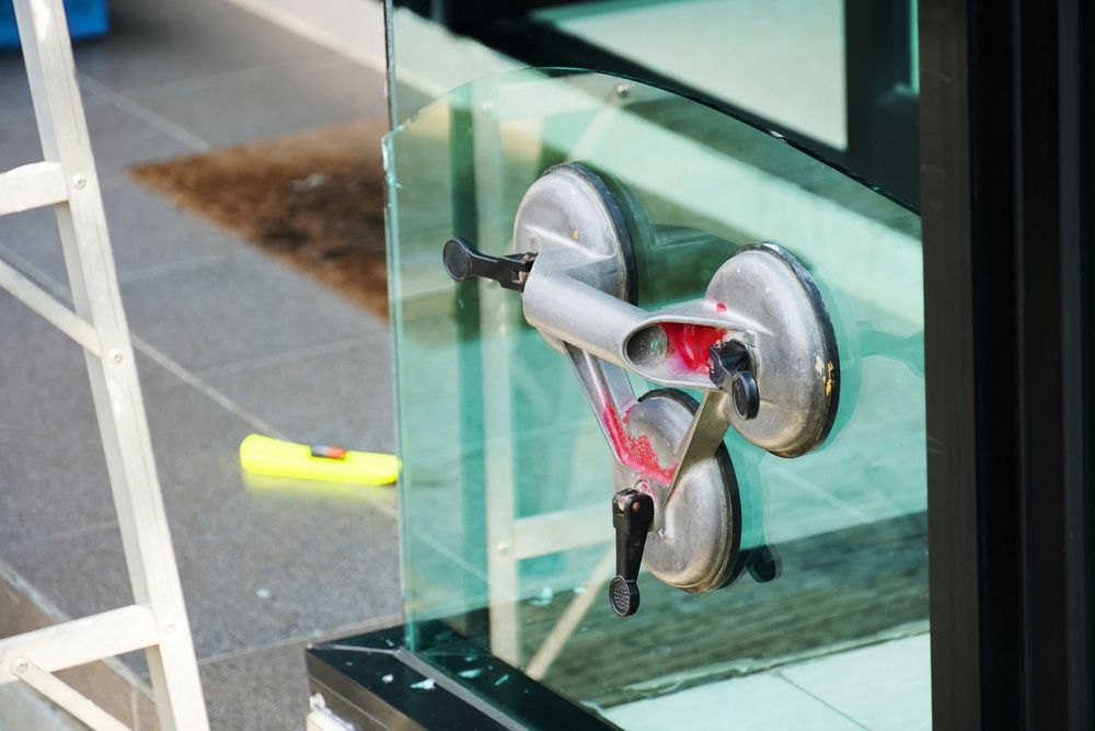 Heavy Duty Vacuum Glass Lifter Installation Broken Glass Windows — Prompt Glass Repairs in Bowen, QLD