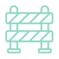 Un icono de una barrera de construcción sobre un fondo blanco.