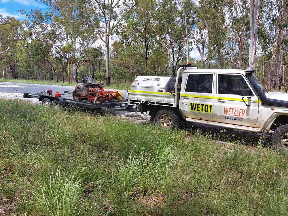 Wetzler Pickup truck with Mulcher in the Trailer — Wetzler Pty Ltd In Marmor QLD