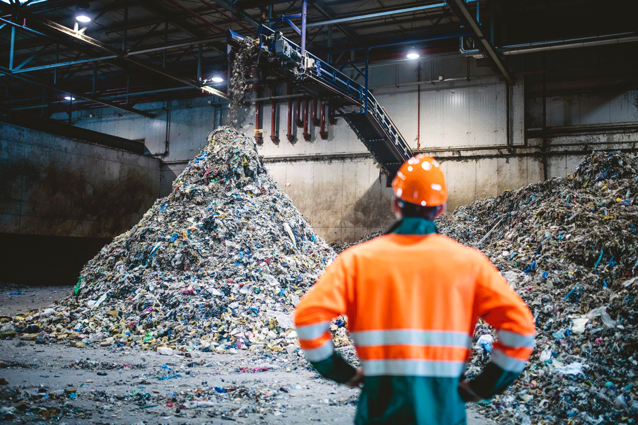 Man Watching A Mountain Of Trash | Onalaska, WI | D &M Recycling