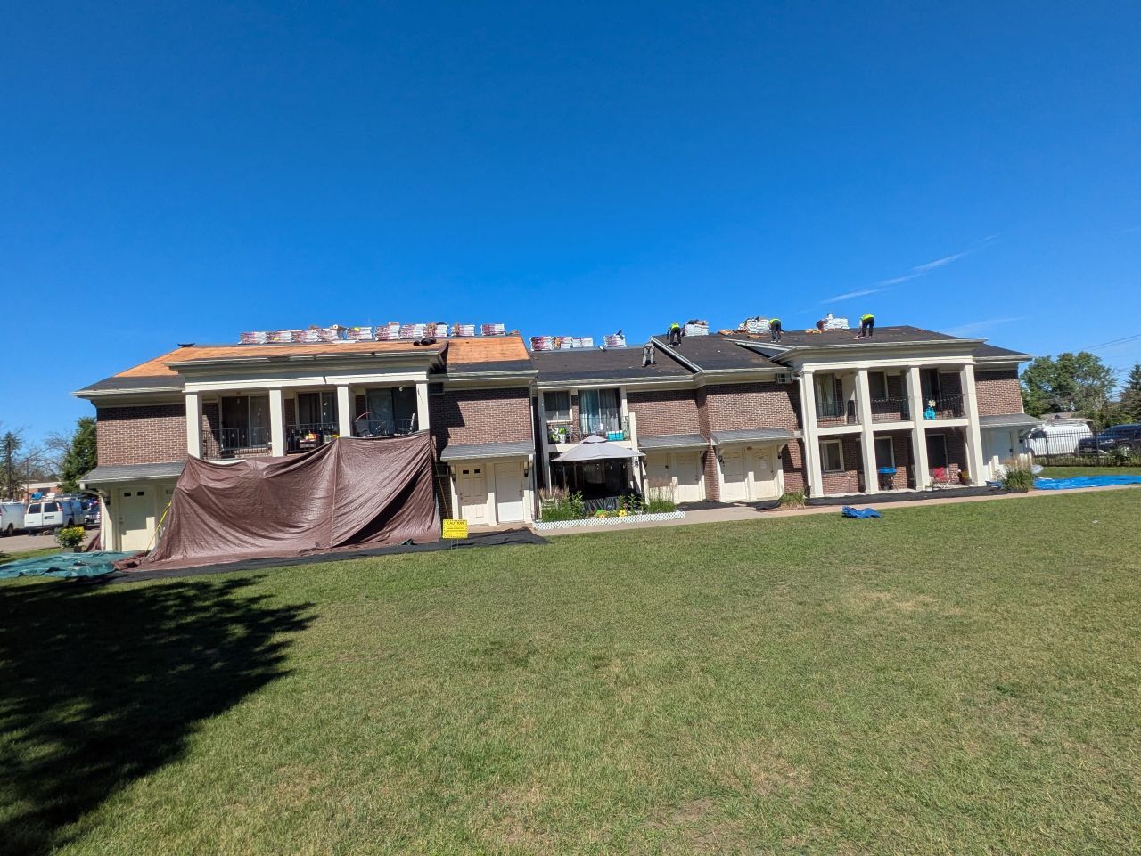 Roofing professional working on a new residential roof.