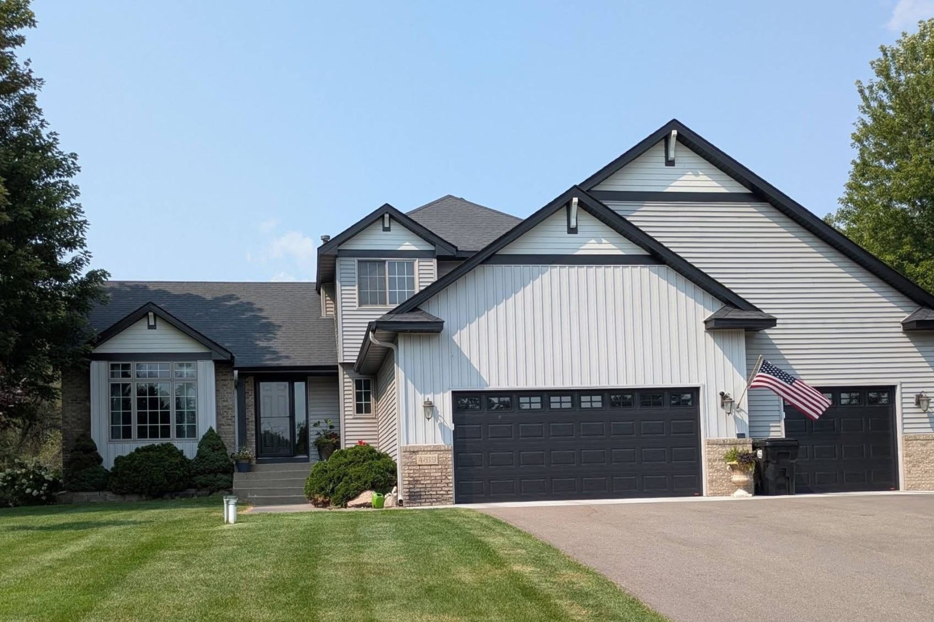 Quality roof installation on a Minnesota home, with underlayment and flashing in place.