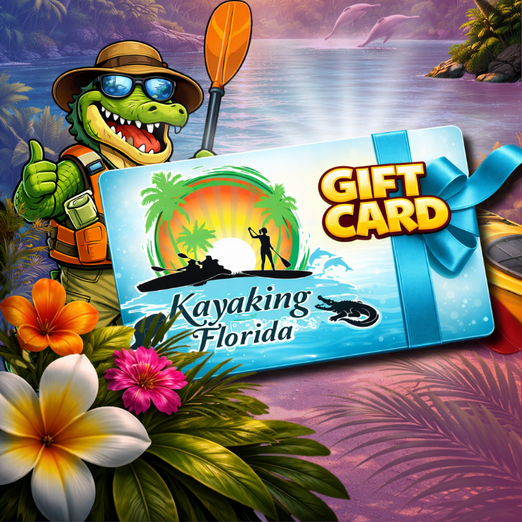 A cartoon alligator in a hat offers a Kayaking Florida gift card with a blue ribbon, flowers, and a lake backdrop.