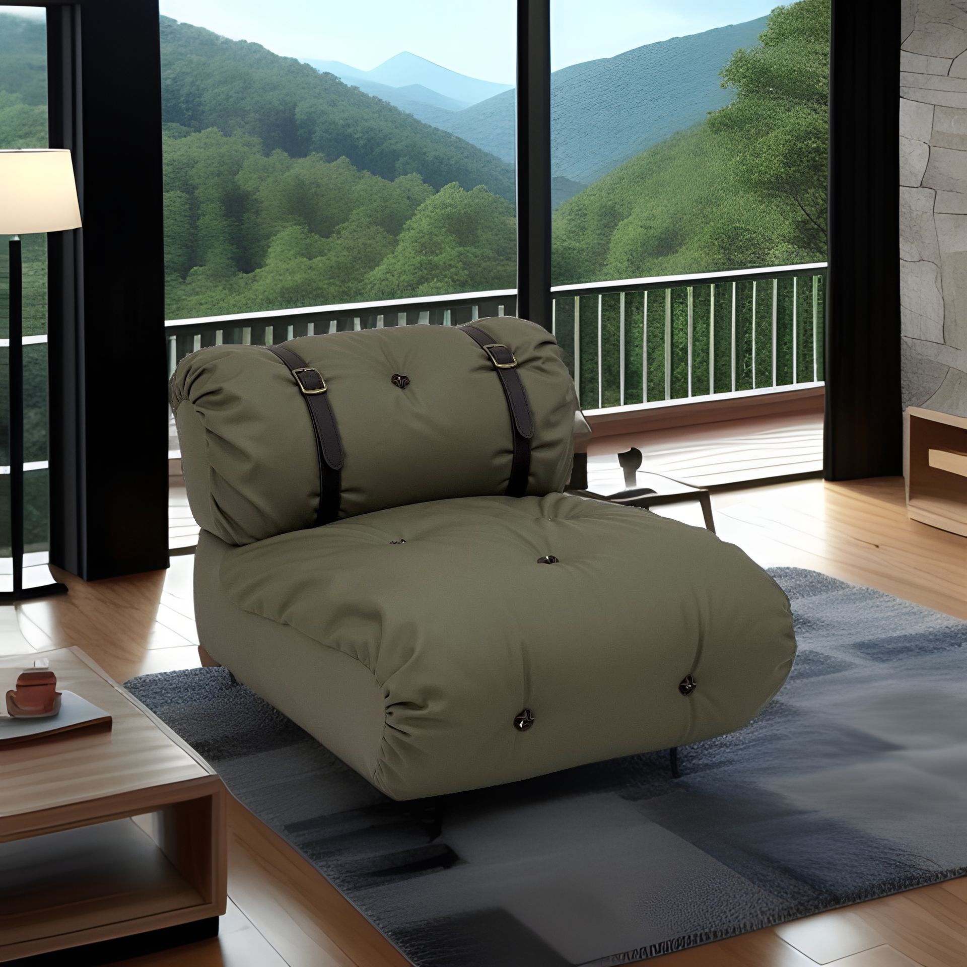 Olive green futon chair with dark straps inside a room with a mountain view.