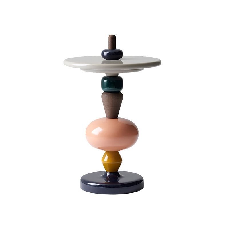 Colorful, stacked wooden side table with a circular top and base; various shapes and colors.