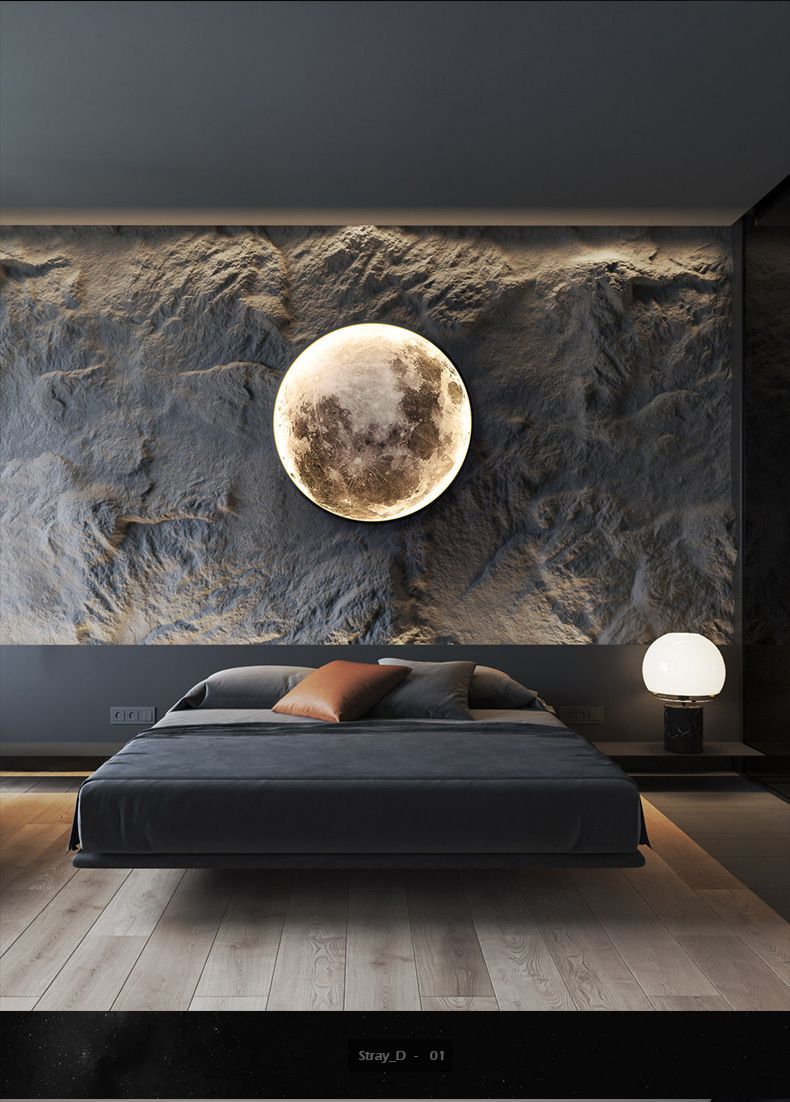 Bedroom with a floating bed, stone wall, moon-shaped light, and a table lamp.