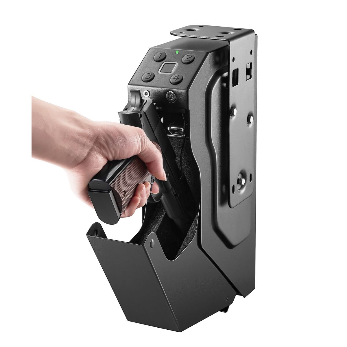 Hand holding a pistol emerging from a wall-mounted black safe with buttons.