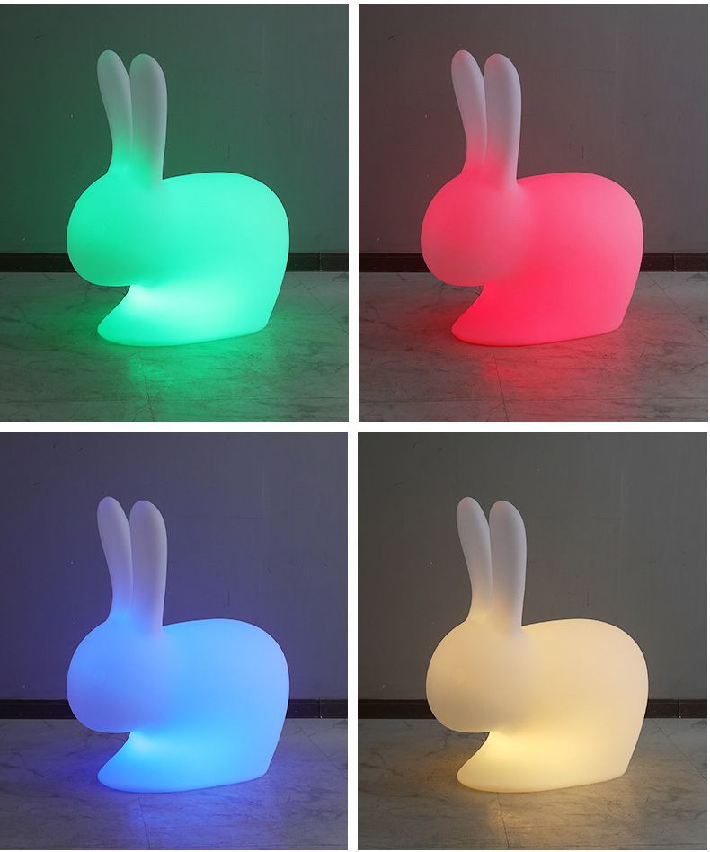 Four-panel view of a glowing, bunny-shaped chair in green, pink, blue, and white.