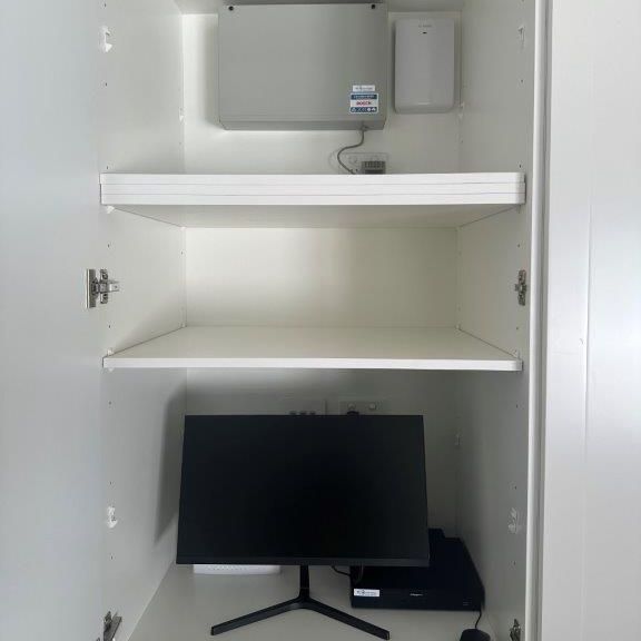 A Computer and Monitor Are Neatly Arranged in a Wooden Cabinet — CTE Systems In Tuncurry, NSW