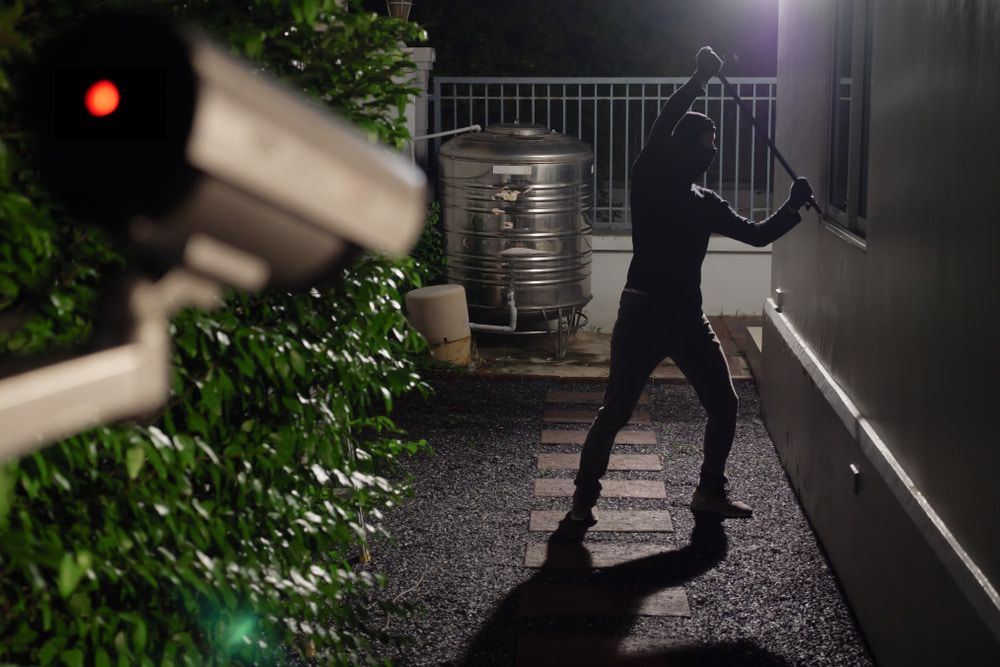 A Thief Breaking in a House — Security Systems in Tuncurry, NSW