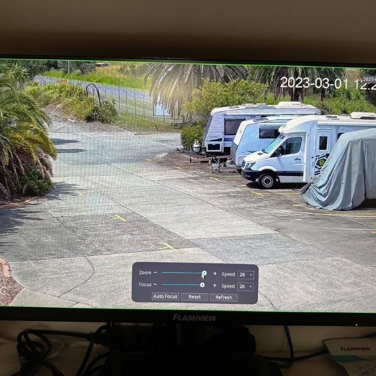 A Computer Monitor Shows a Camper Parked in a Lot — CTE Systems In Tuncurry, NSW
