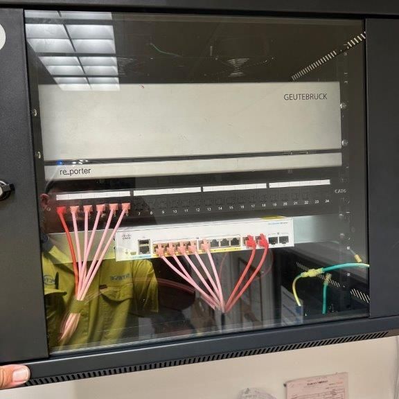 A Person Holds an Electric Box — CTE Systems In Tuncurry, NSW