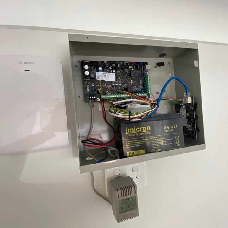 A White Electrical Box Mounted on a Wall — CTE Systems In Tuncurry, NSW