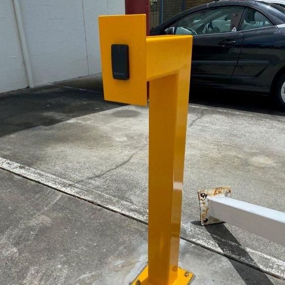 A Keypad Mounted on a Yellow Stand — CTE Systems In Tuncurry, NSW