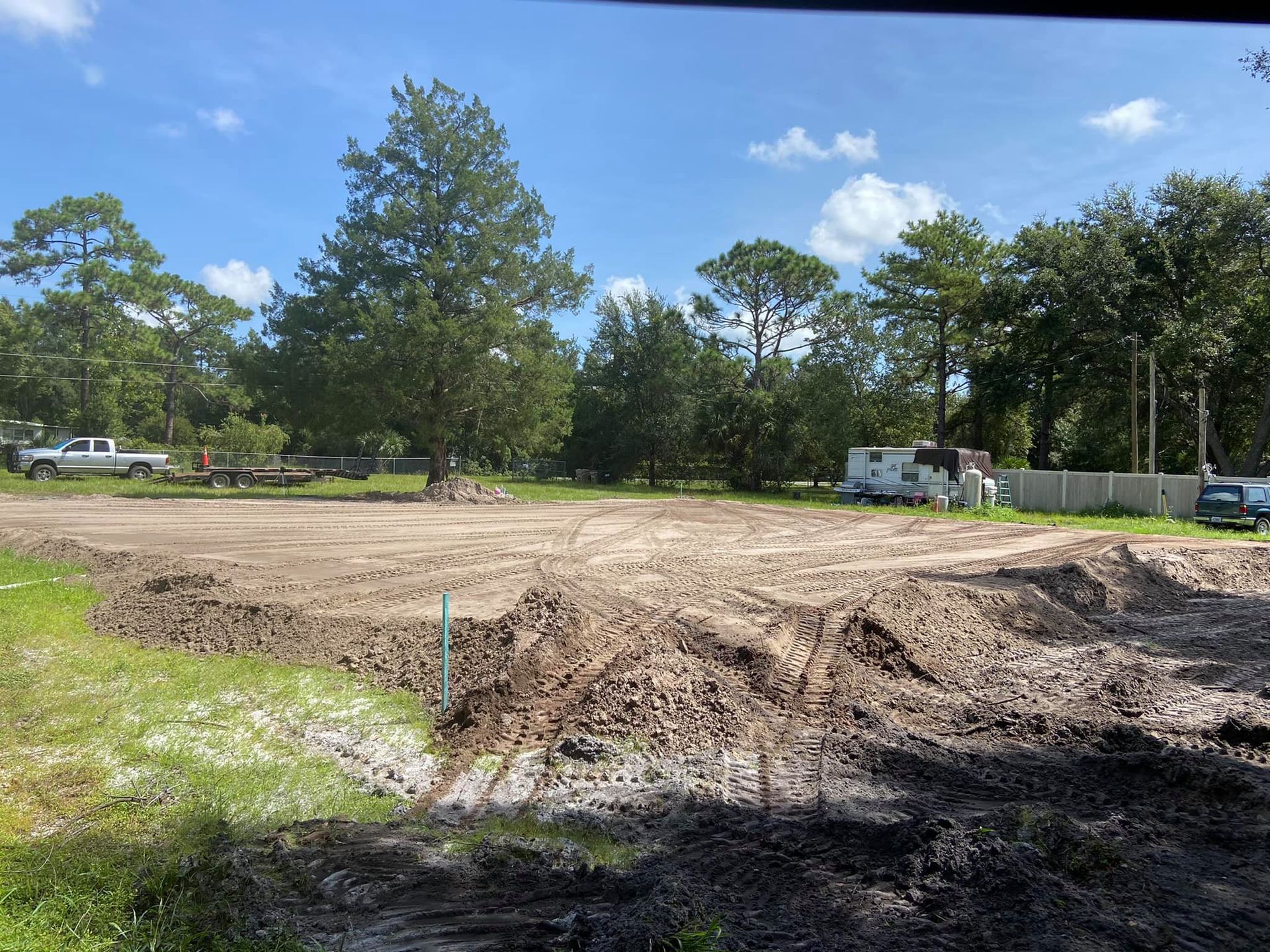 graded land with dirt on the edges