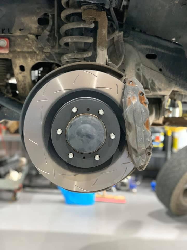 Car's Front Brake Assembly With Slotted Rotor — D.A.G Automotive in Unanderra, NSW