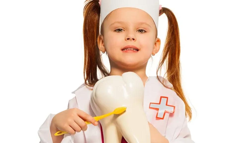 young girl with braces in a dental surgery